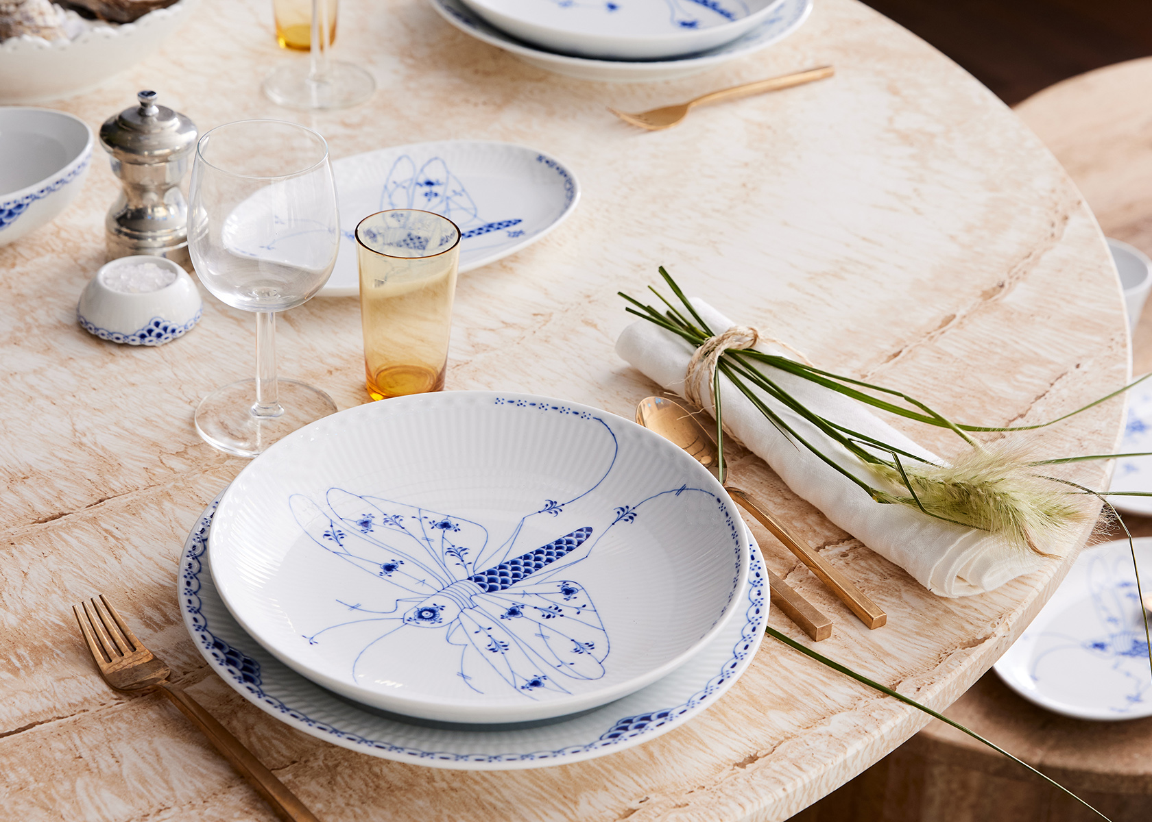 A nordic inspired table set for two with Royal Creatures Shallow Bowls and Princess plates